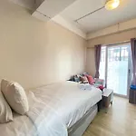 Scandinavian Studio Room At Grand Asia Afrika Apartment By Travelio