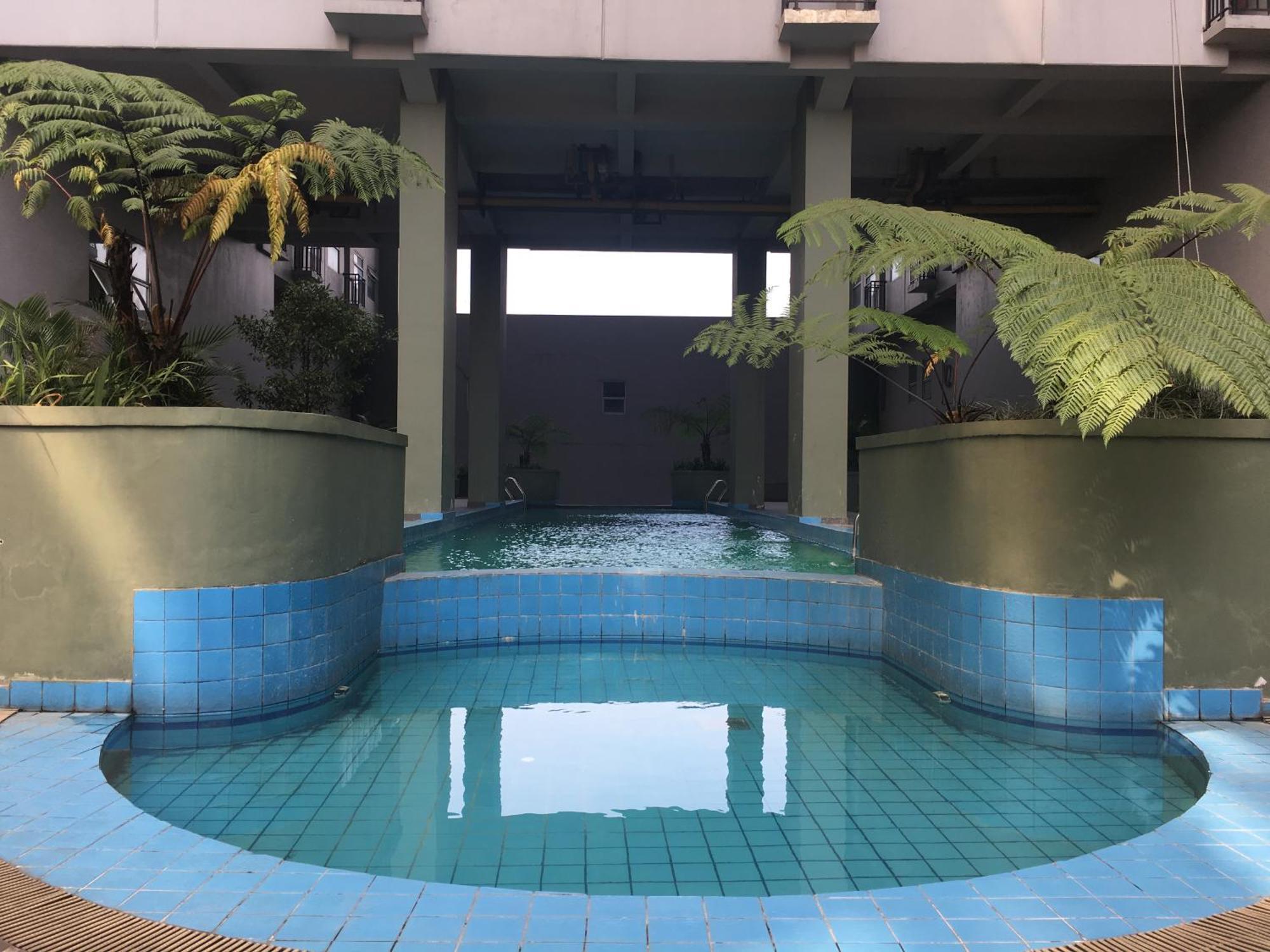 Scandinavian At Grand Afrika By Travelio Apartemen *