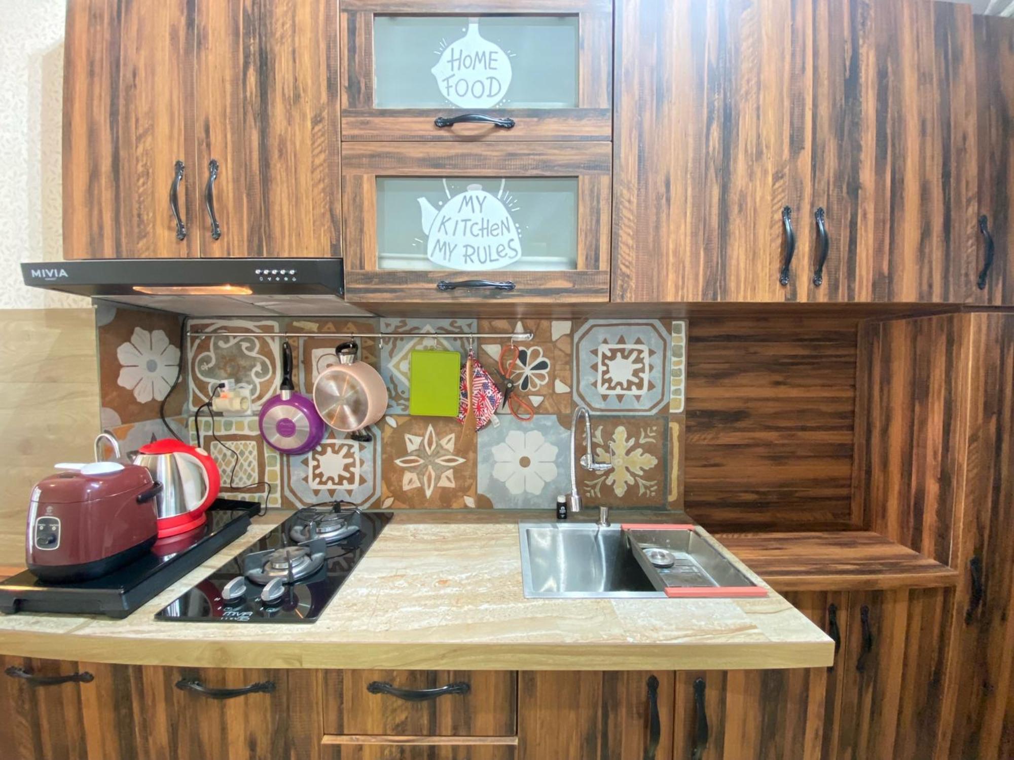 Scandinavian At Grand Afrika By Travelio Apartemen